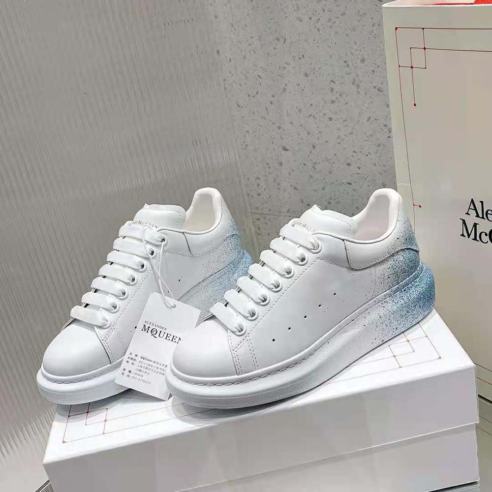 Close-up of brushed silver heel tab on Alexander Mcqueen Women Oversized Sneaker