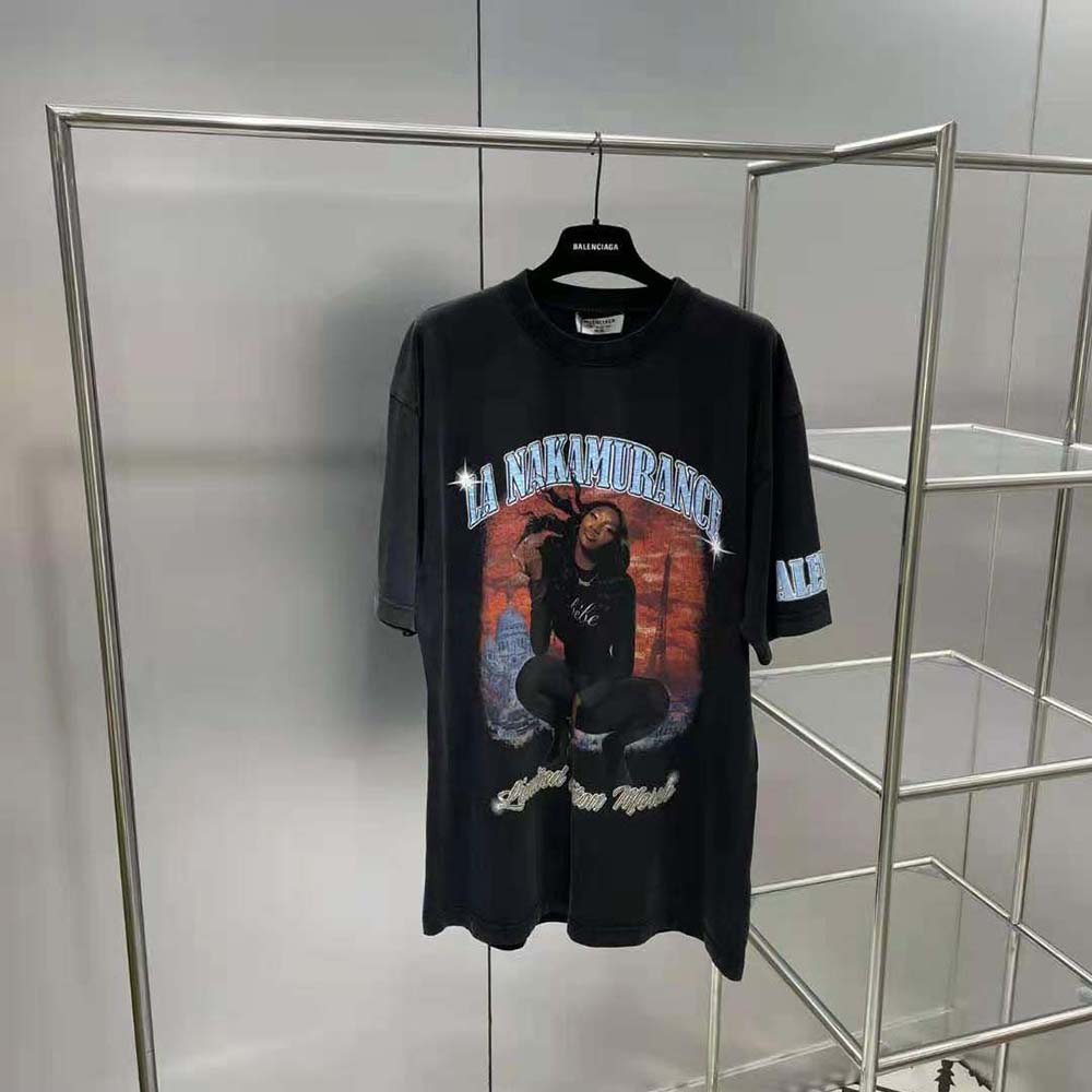 Close-up on music merch graphic detail on Balenciaga black T-shirt