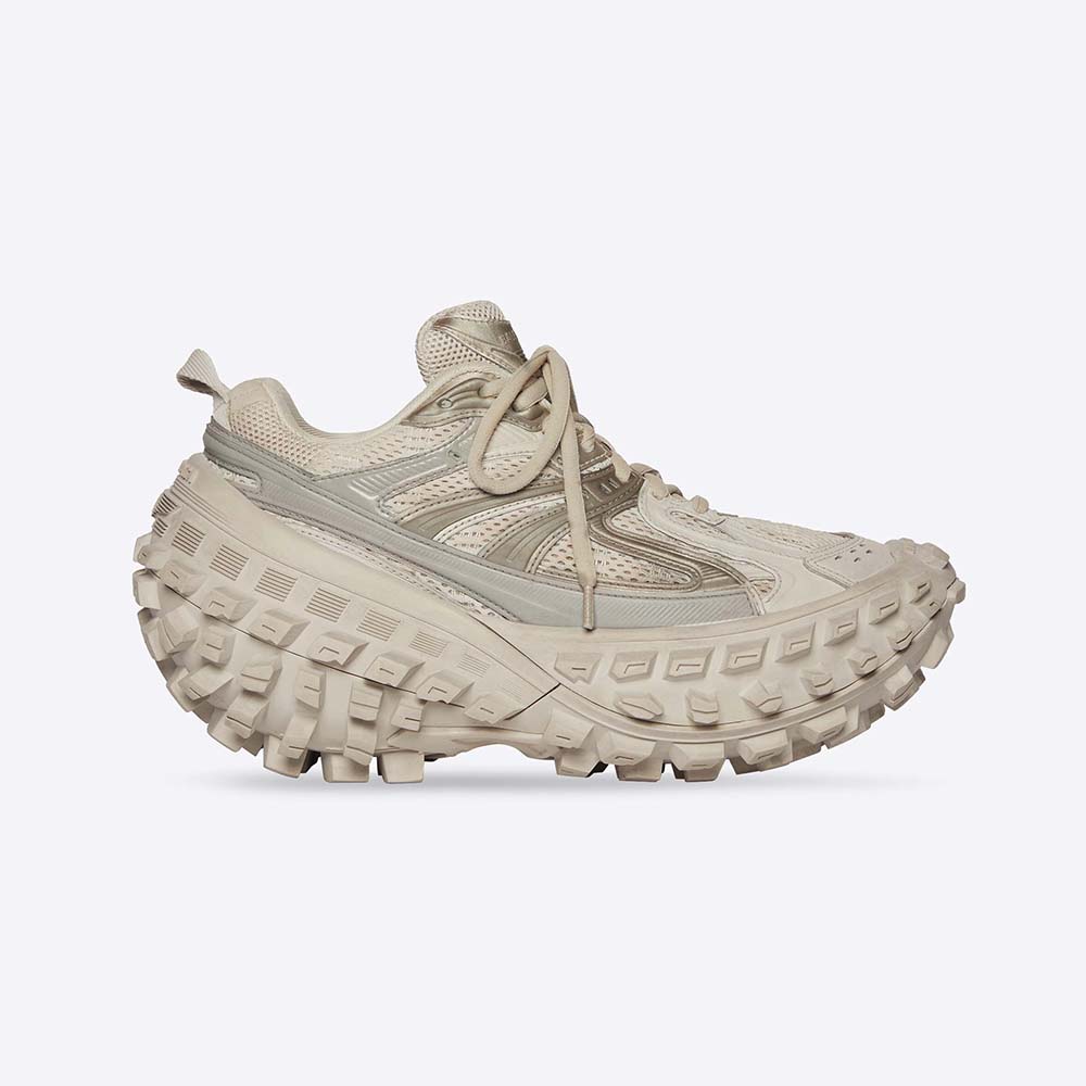 Side view of Balenciaga Unisex Defender Sneaker in beige mesh and nylon