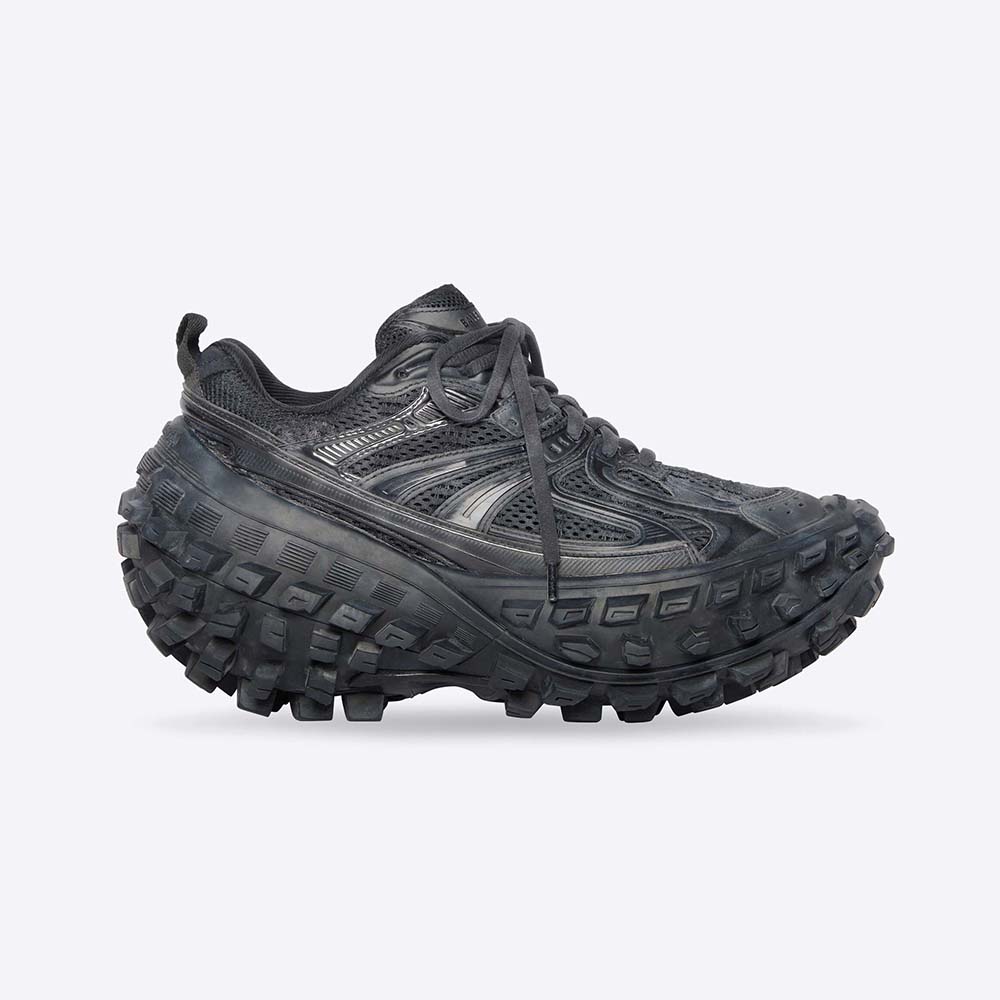 Side angle of Balenciaga Unisex Defender Sneaker in black mesh and nylon