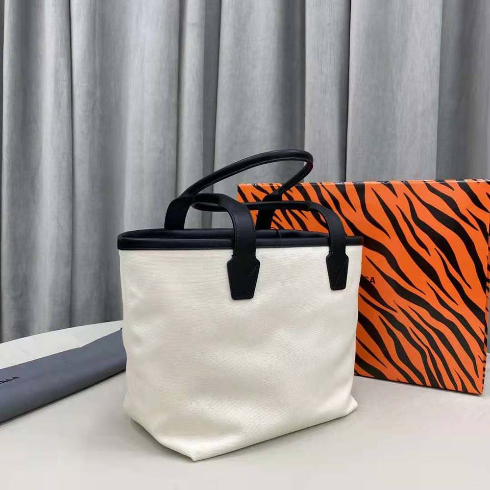 Side angle showing silver hardware on Balenciaga Cities Paris tote bag