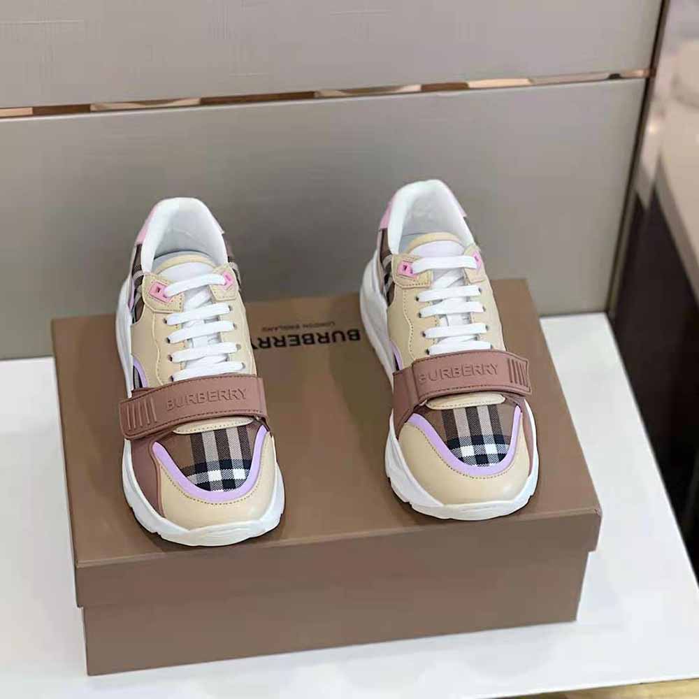 Close-up of Burberry pink sneakers leather and check pattern detail