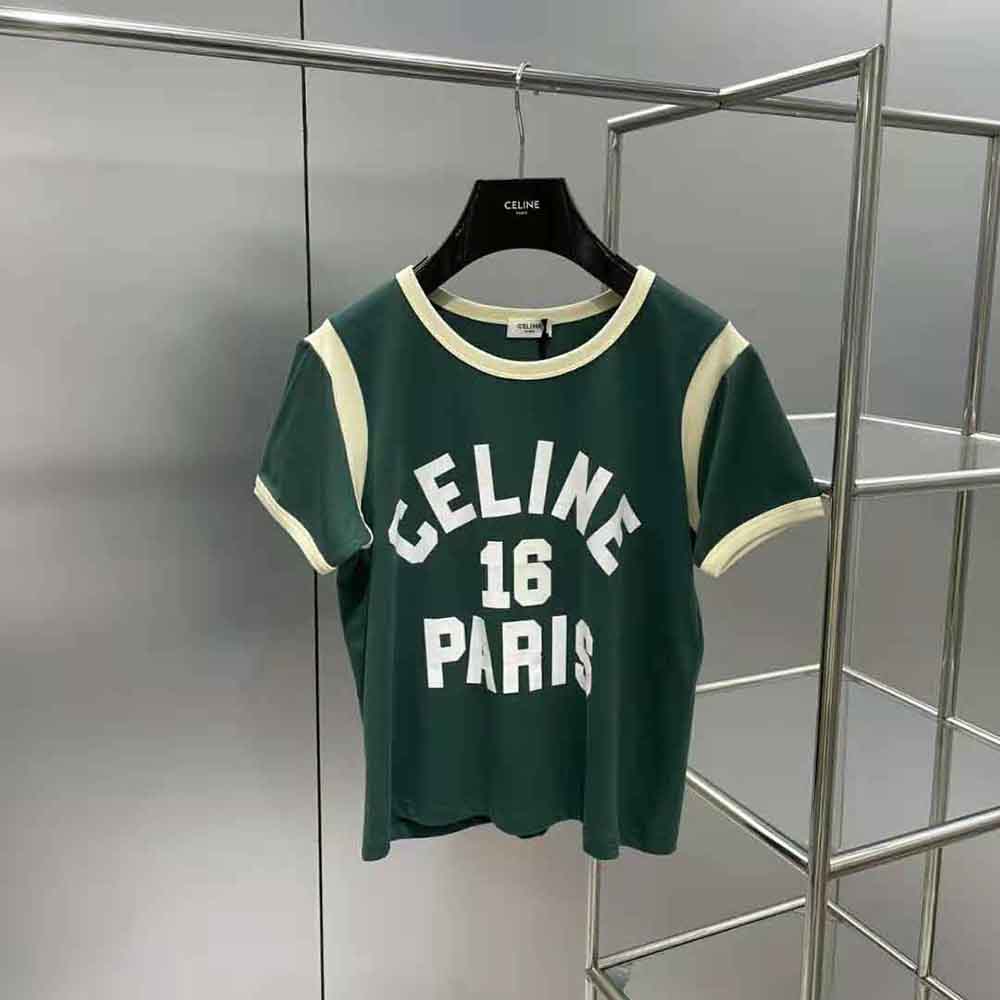 Close-up of green cotton jersey fabric and Celine logo detail