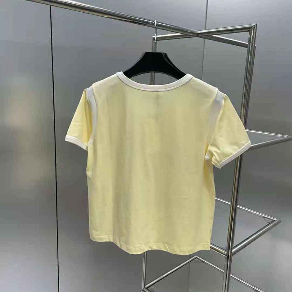 Side angle showing relaxed boxy fit of Celine Women 16 Boxy T-shirt