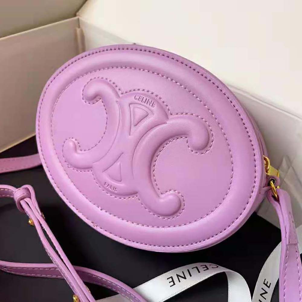 Side profile showing slim silhouette of Celine Women Crossbody Oval Purse purple
