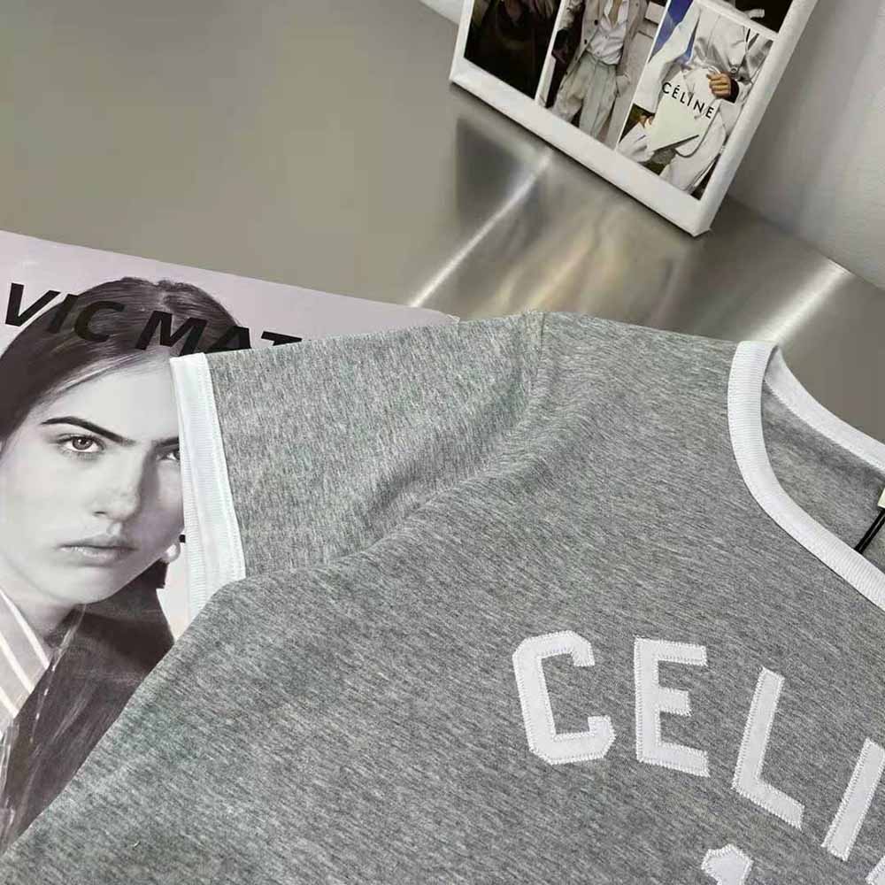 Close-up of embroidered Celine logo on silver cotton jersey T-shirt