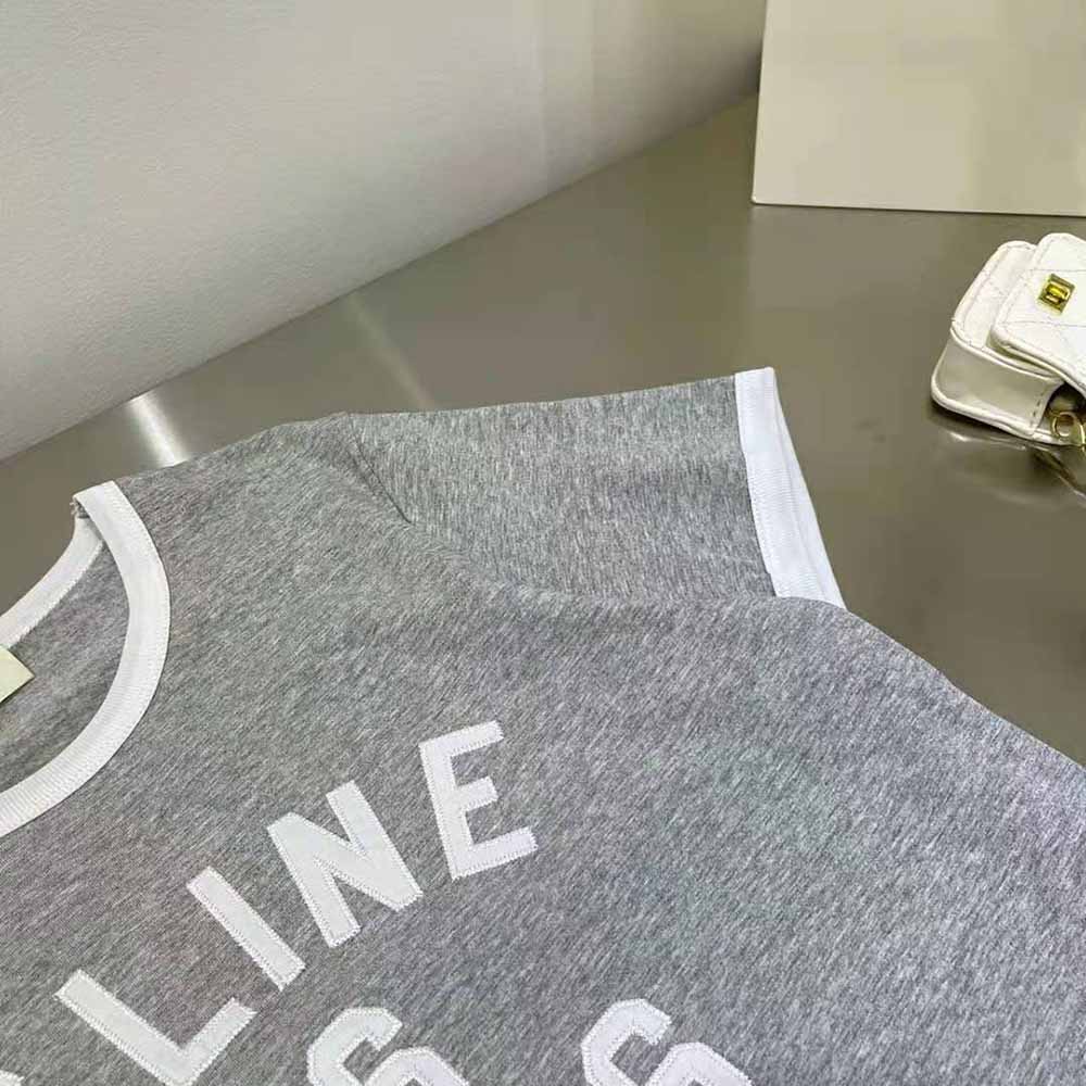 Side angle showing fit and texture of Celine Women Embroidered Celine 16 T-shirt