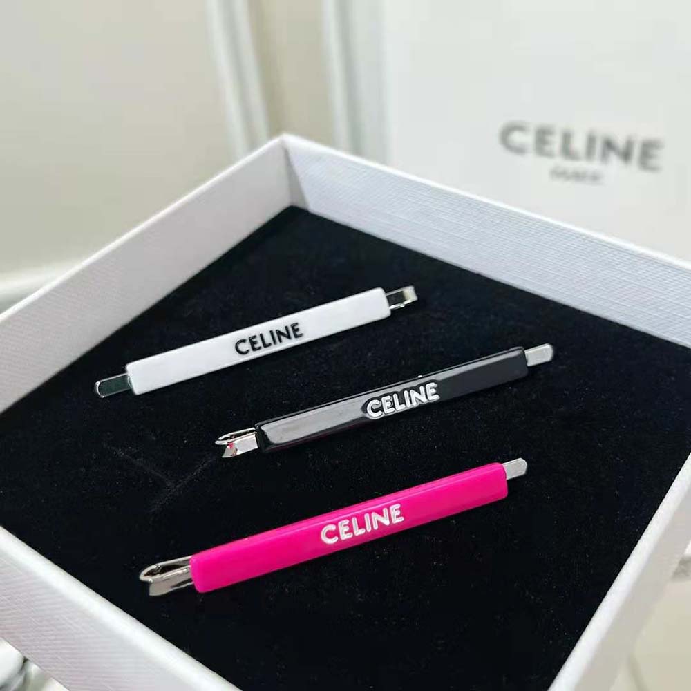 Three white hair clips from Celine Women Monochroms set displayed side-by-side