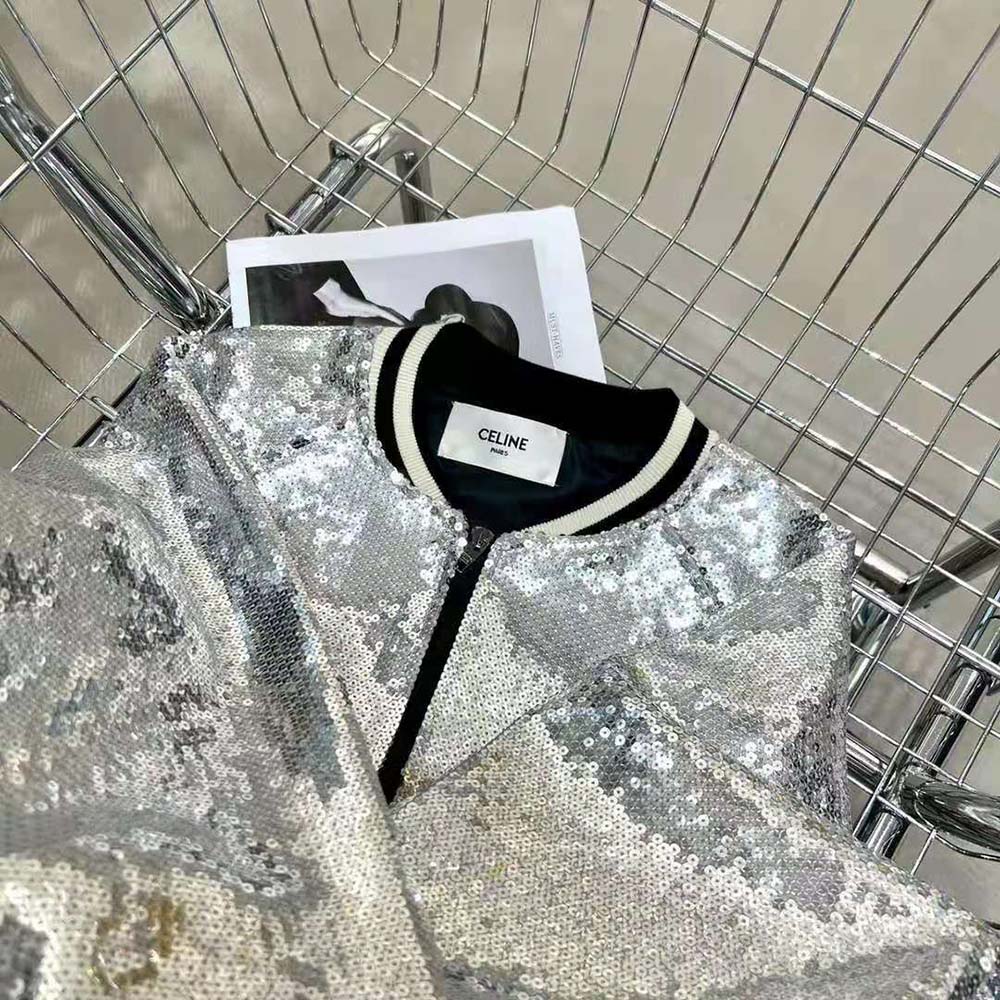 Close-up of silver branded zipper and cotton fleece fabric texture on Celine jacket