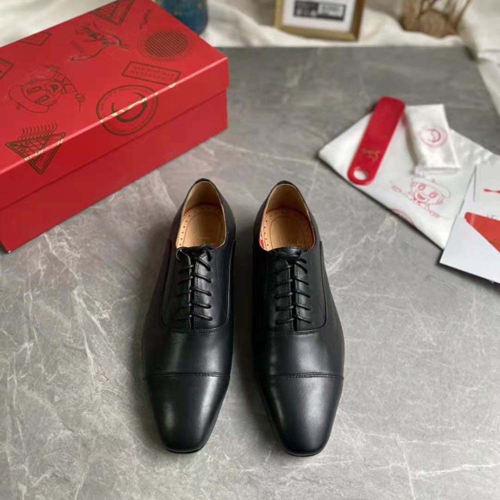 Close-up detail of black calf leather on Christian Louboutin Men Greggo