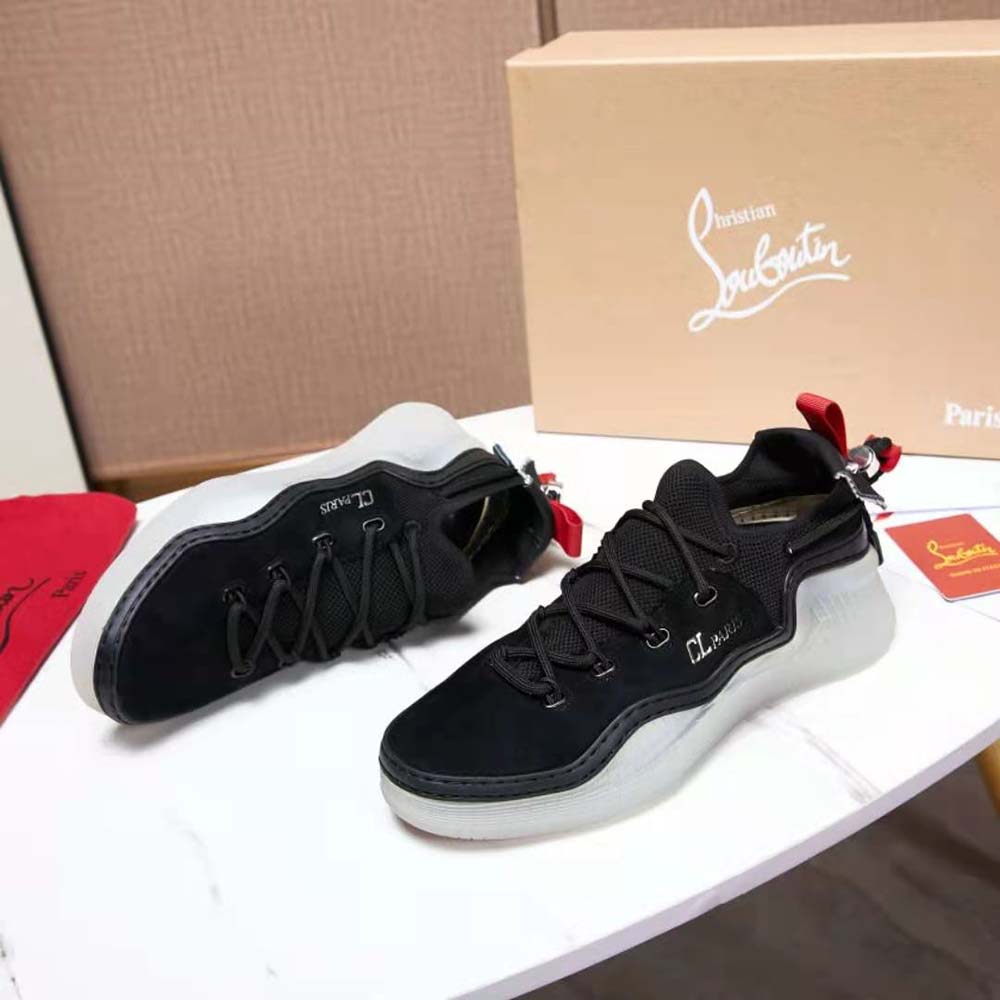 Close-up of black suede texture on Christian Louboutin Arpoador Donna