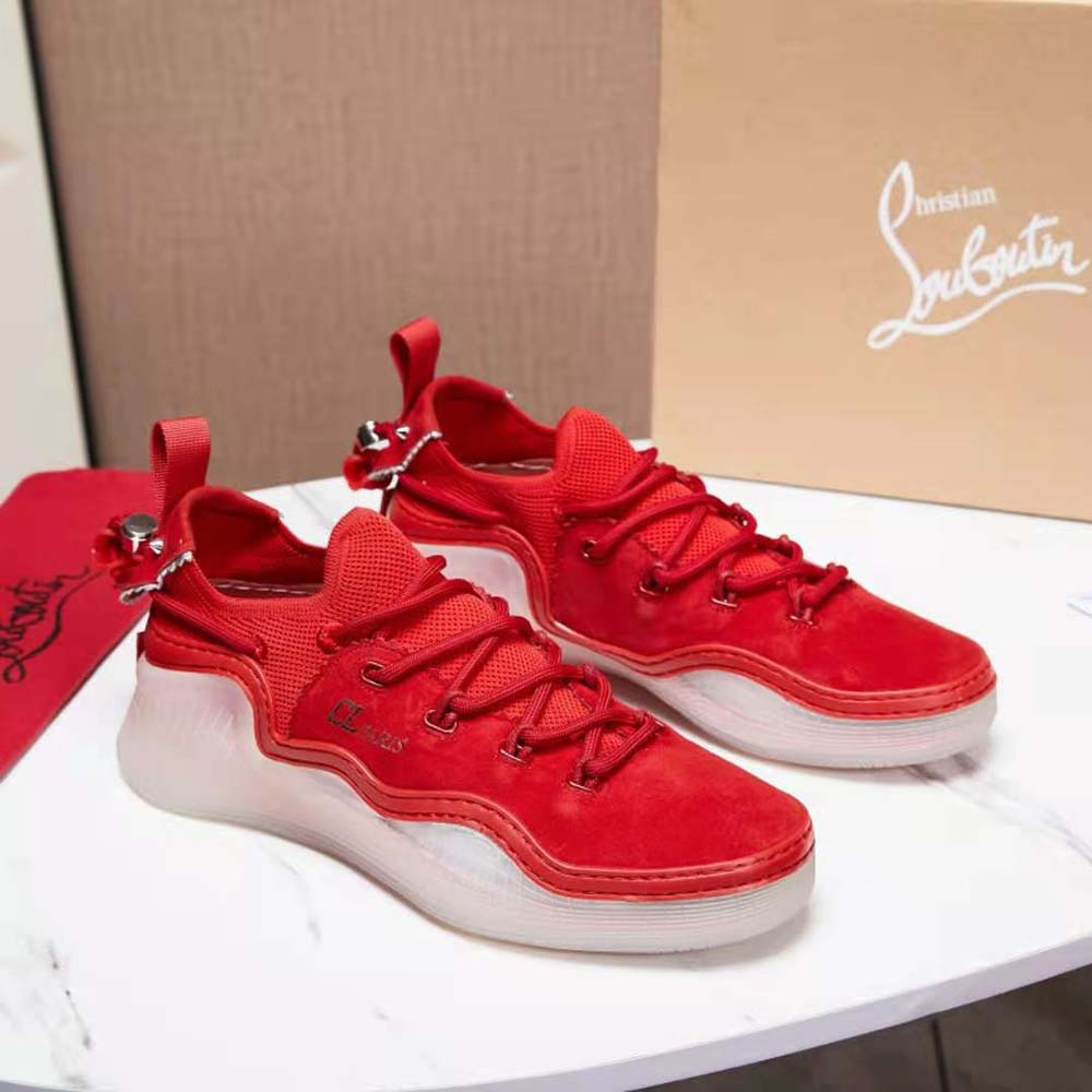 Close-up of red suede texture and signature sole on Christian Louboutin Women Arpoador Donna