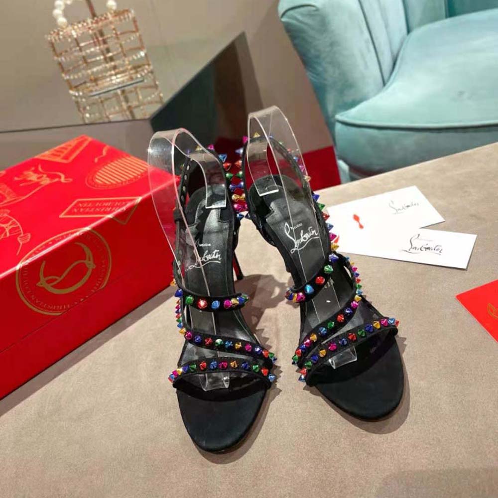 Close-up of black leather and signature red sole on Spikita Strap heels