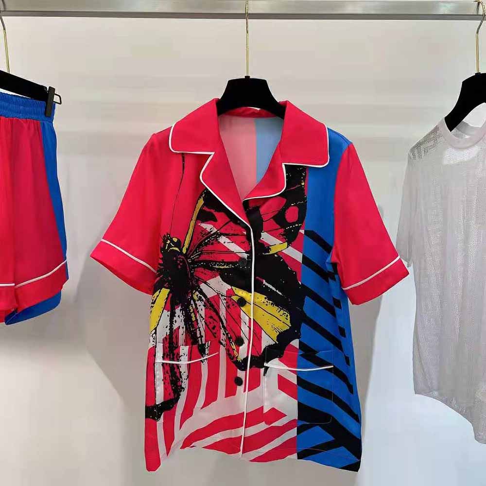 Side angle showing relaxed fit of Dior Women Chez Moi silk shirt
