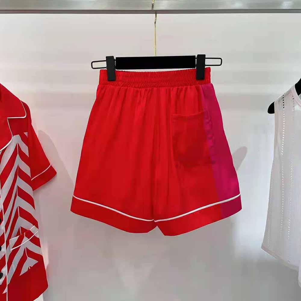 Side angle showing relaxed tailored fit of Dior Women Chez Moi Shorts