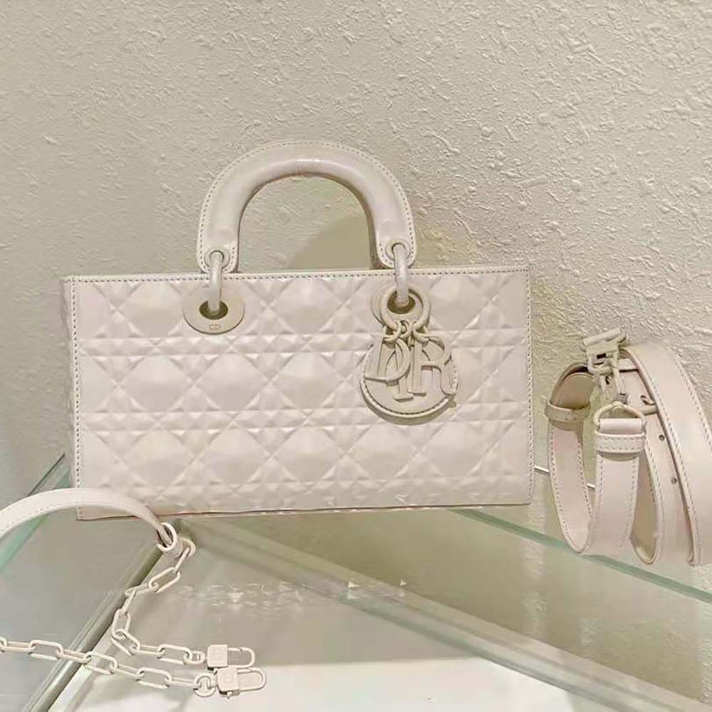 Close-up on diamond motif hardware and latte calfskin texture