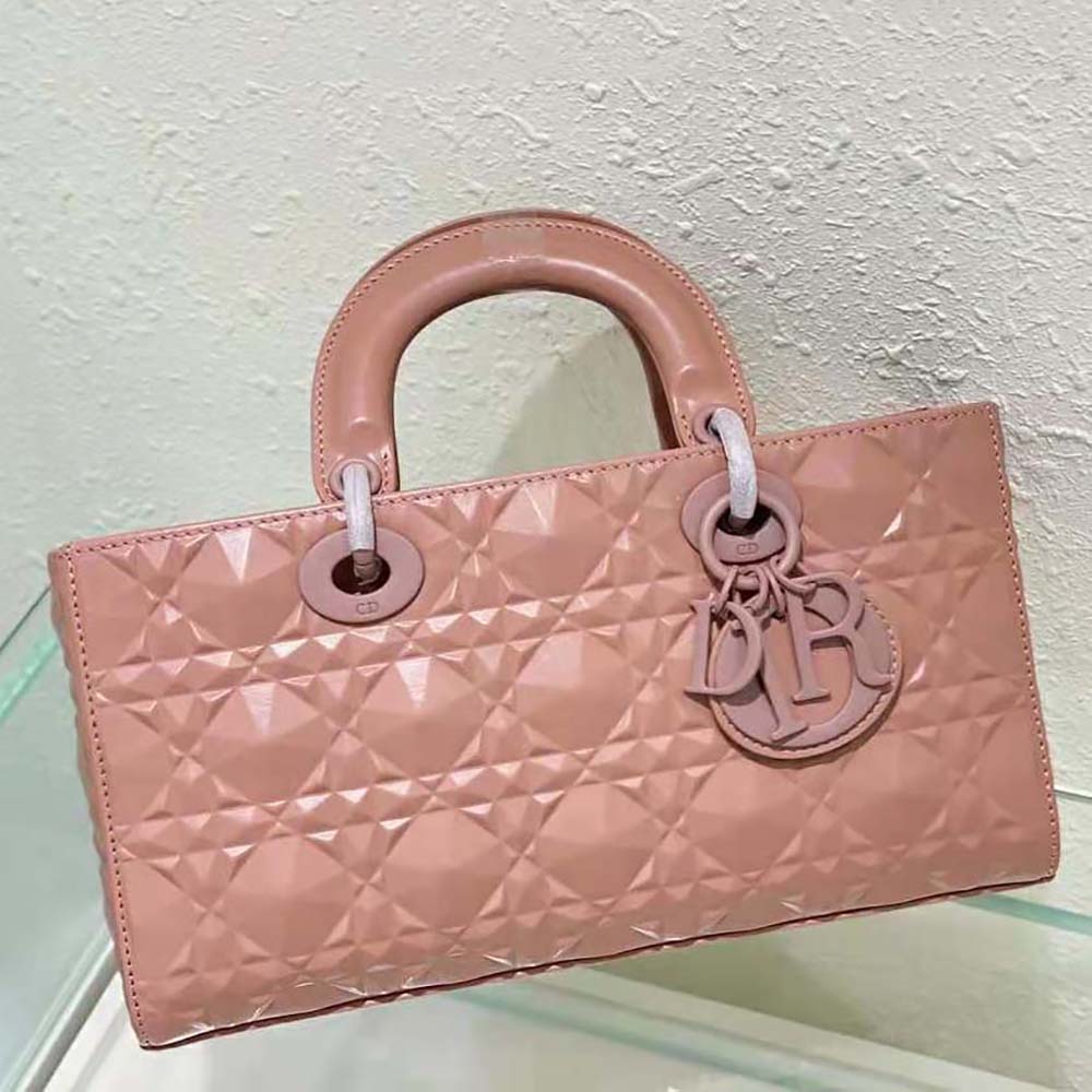 Side view showing flap closure and silver hardware on the Dior Lady D-Joy Bag