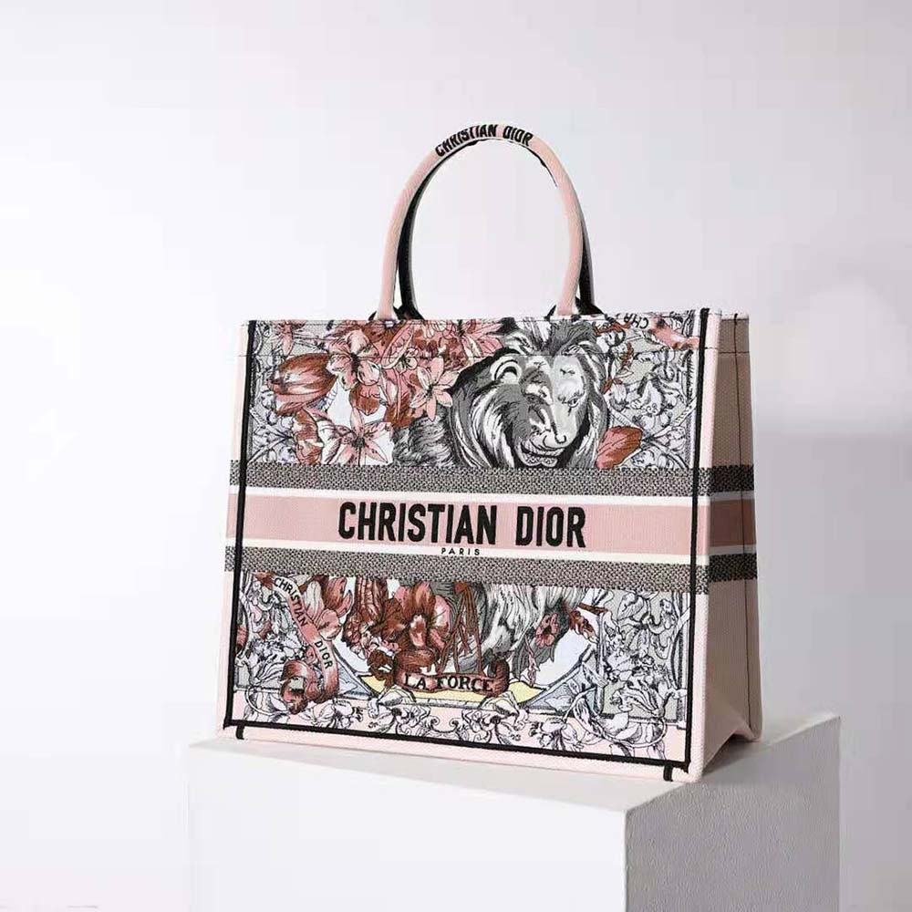 Side angle showing gold-tone hardware on Dior Women Large Dior Book Tote