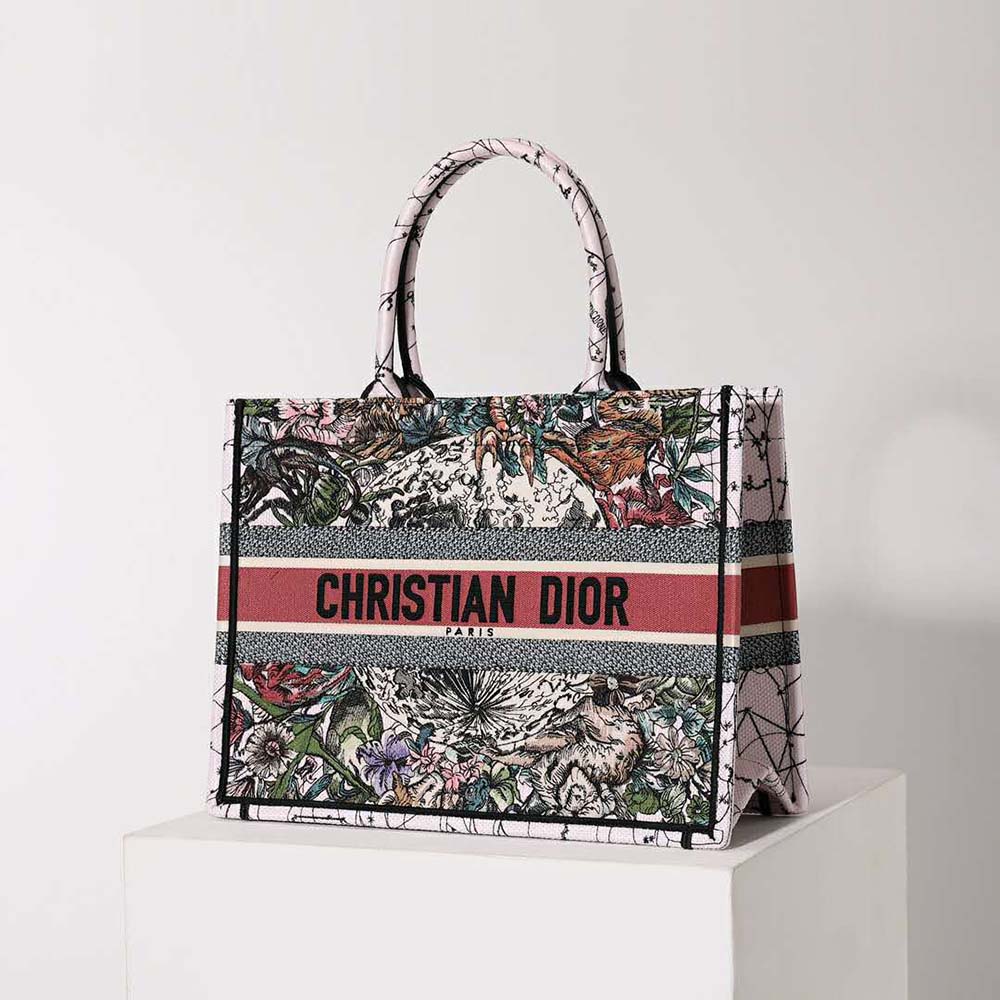 Side angle showing tote silhouette and silver-tone hardware