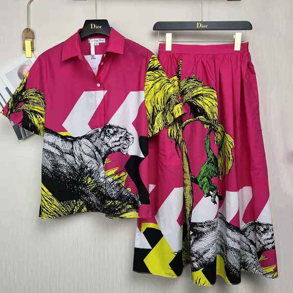Close-up of multicolor D-Tiger pop motif on pink cotton poplin skirt