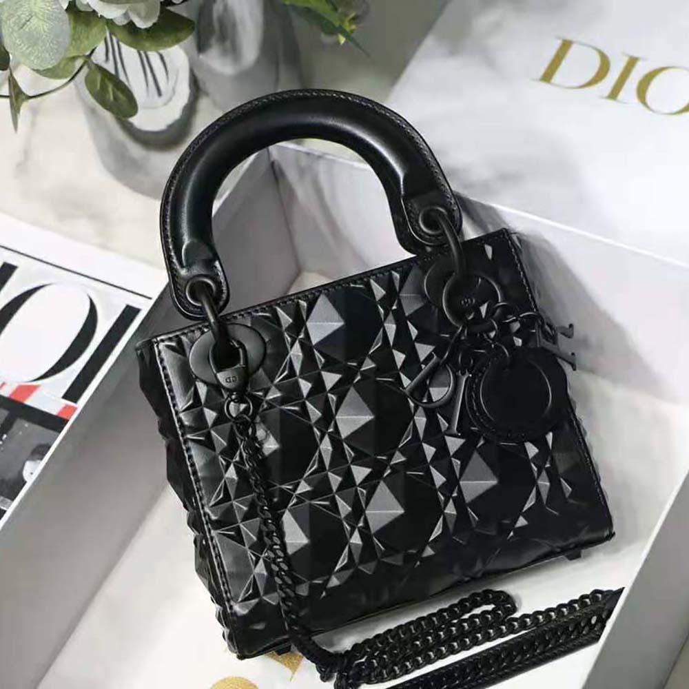 Close-up of diamond motif hardware on Dior Women Mini Lady Dior Bag