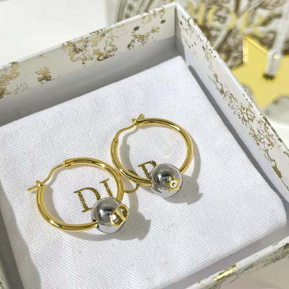 Close-up detail of intertwined CD logo on Dior Women Petit CD Earrings