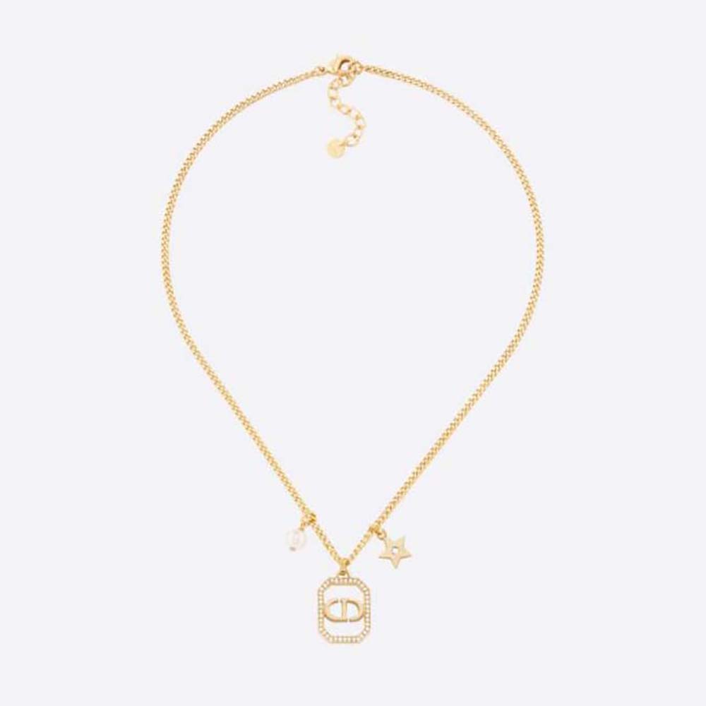 Close-up of Dior Women Petit CD Necklace gold-finish and pearl detail