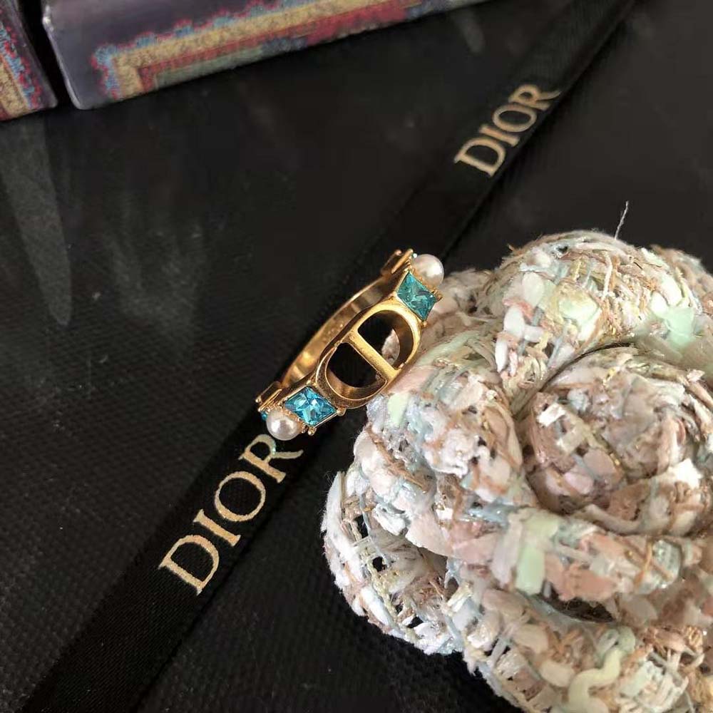 Dior Women Petit CD Ring styled on hand with soft natural light
