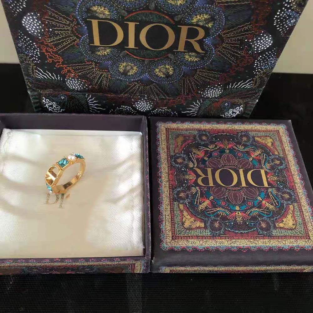 Side angle of Dior Women Petit CD Ring highlighting white resin pearls