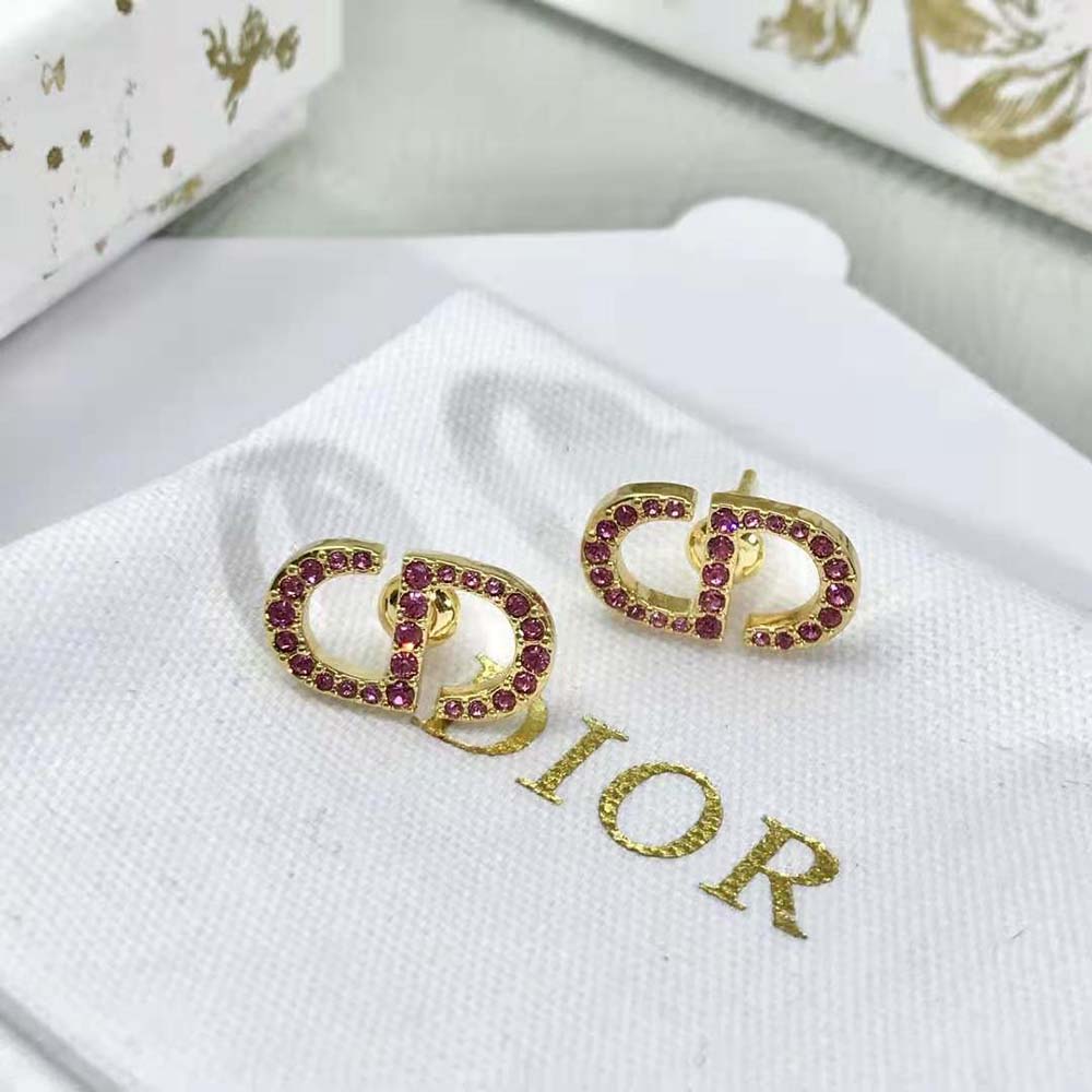 Close-up of light pink crystals on Dior Women Petit CD Stud Earrings