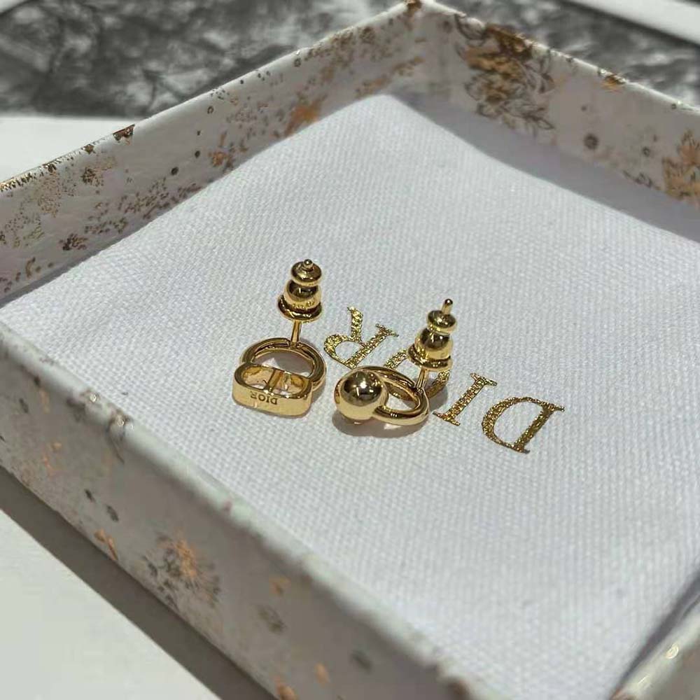 Dior Women Petit CD Stud Earrings worn on ear highlighting petite silhouette