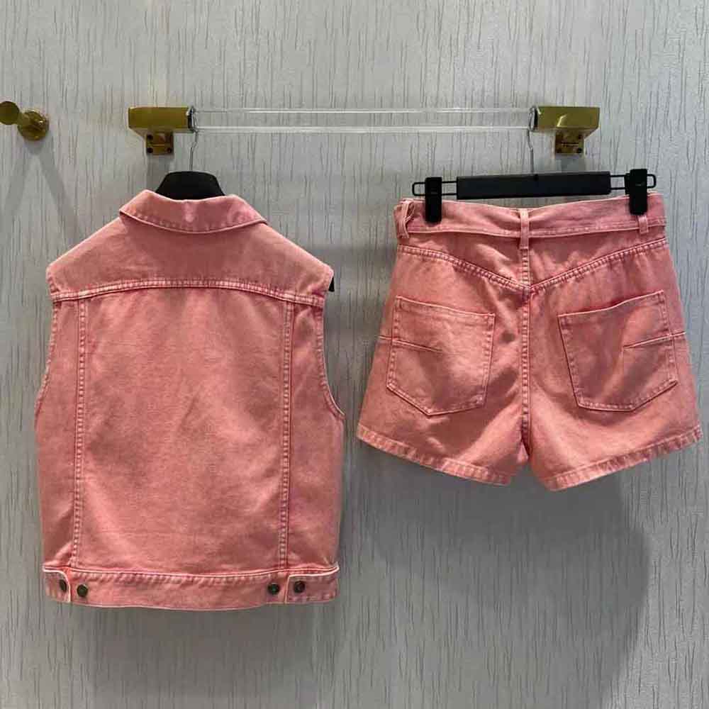 Back view showcasing tailored fit of Dior Women Shorts Pink Cotton Denim