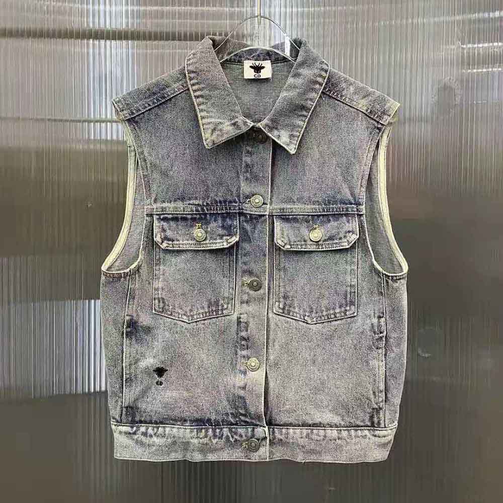 Side angle showing tailored silhouette of Dior blue denim jacket