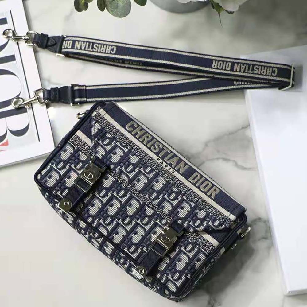 Close-up of blue Dior Oblique embroidery on Dior Women Small Diorcamp Bag