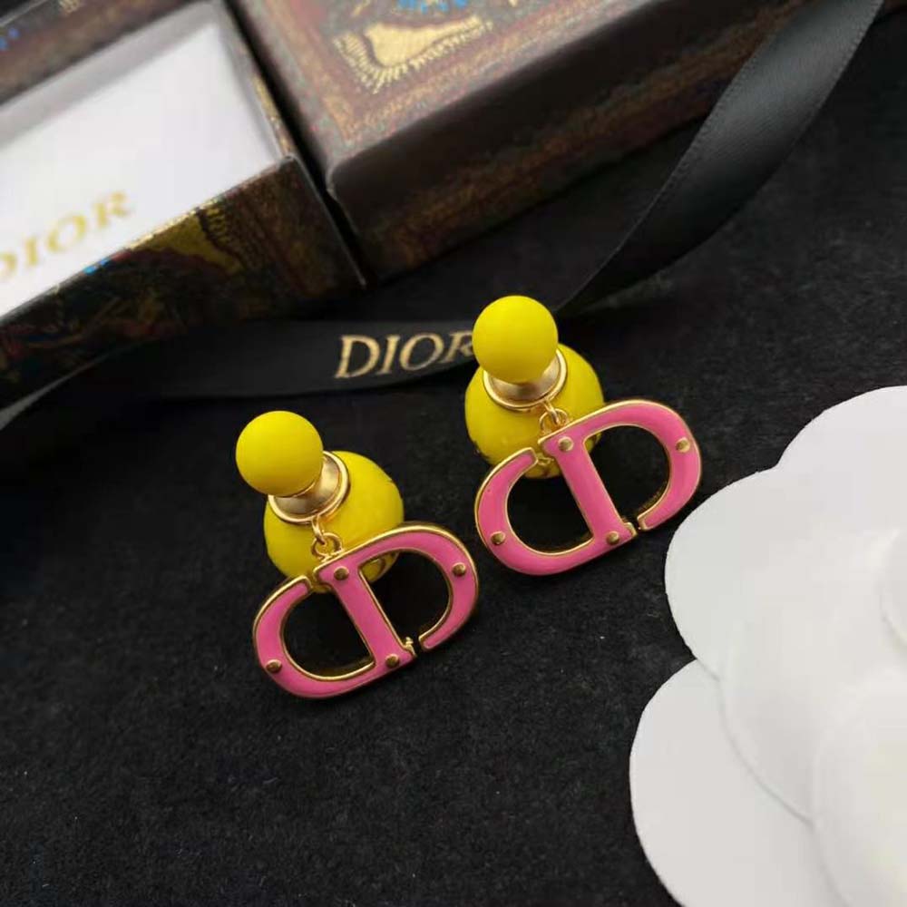 Close-up detail of fluorescent yellow lacquer on Dior Women Tribales Earring