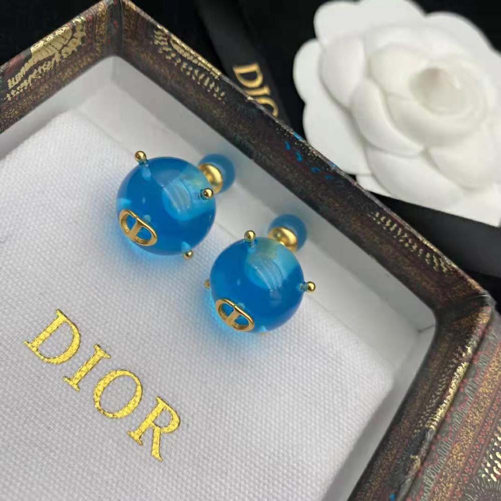 Side angle showing double-sided silhouette of Dior Women Tribales Earrings