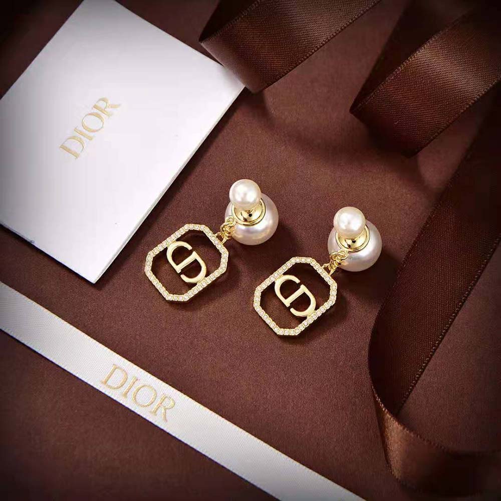 Close-up detail of white resin pearls on Dior Women Tribales Earrings