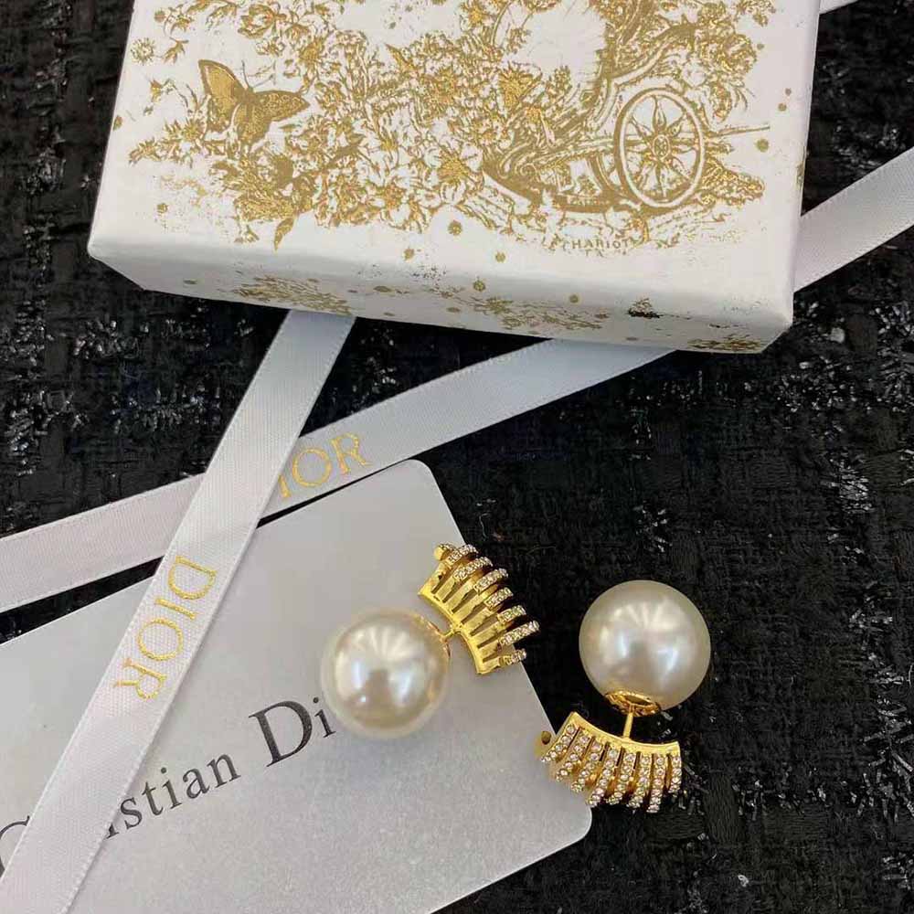 Side angle showing double-sided design of Dior Women Tribales Earrings