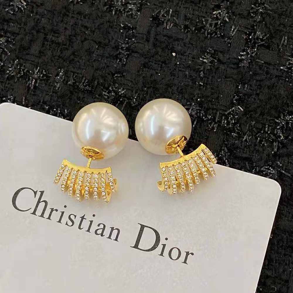 Close-up detail of gold-finish metal and white crystals on Dior Women Tribales Earrings