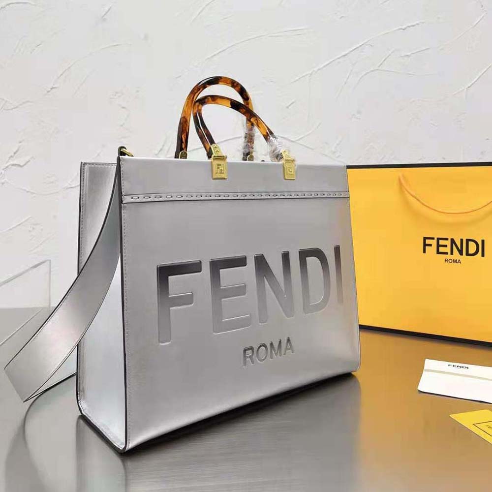 Close-up detail of silver laminated leather and hardware on Fendi Sunshine bag