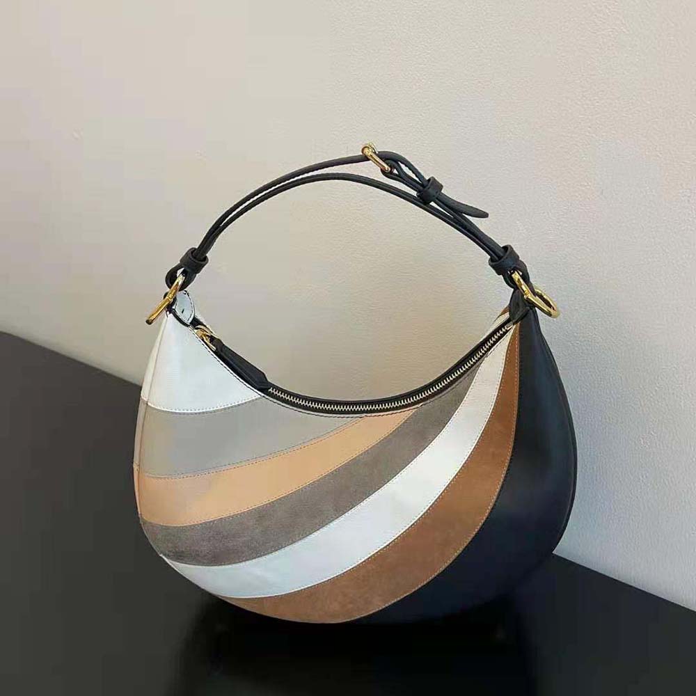 Side angle showing compact silhouette of Fendi Women Fendigraphy Small Leather Bag