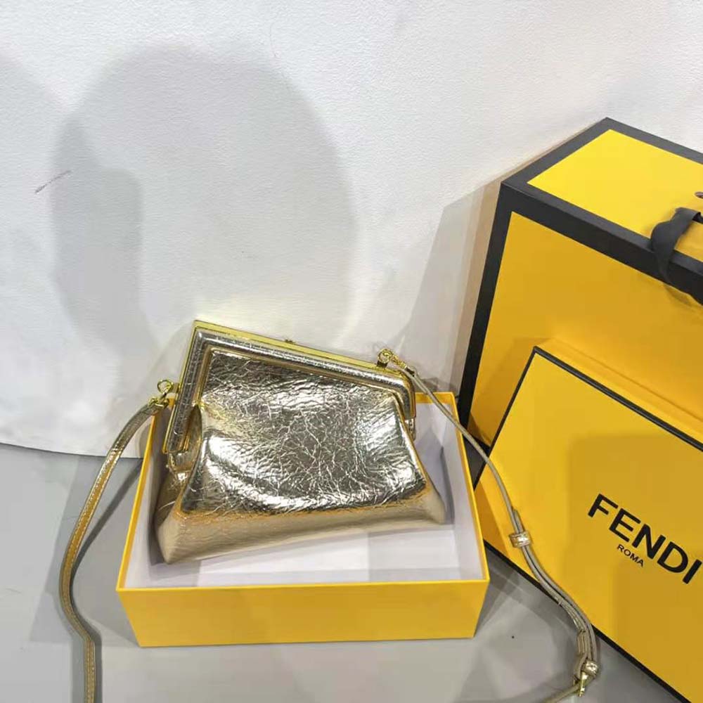 Side angle showcasing compact silhouette of Fendi Women First bag