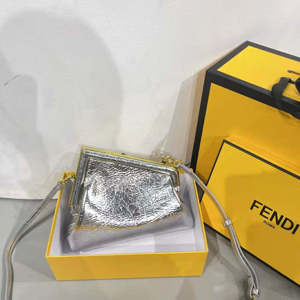 Side angle showing glossy finish of Fendi Women First Small bag