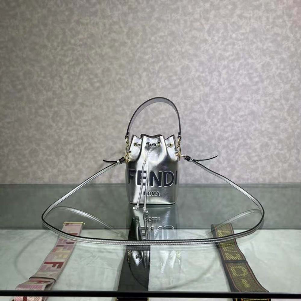 Close-up of gold-tone FF logo charm on Fendi Mon Tresor bag