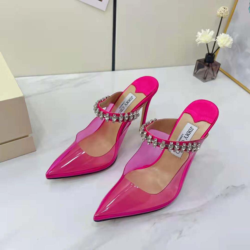 Top angle showing hot pink neon plexi and stiletto heel on Jimmy Choo Bing 100