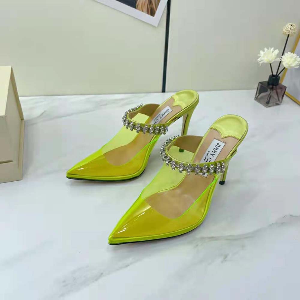 Rear angle showing heel height of Jimmy Choo Women Bing 100 Neon Yellow Mules
