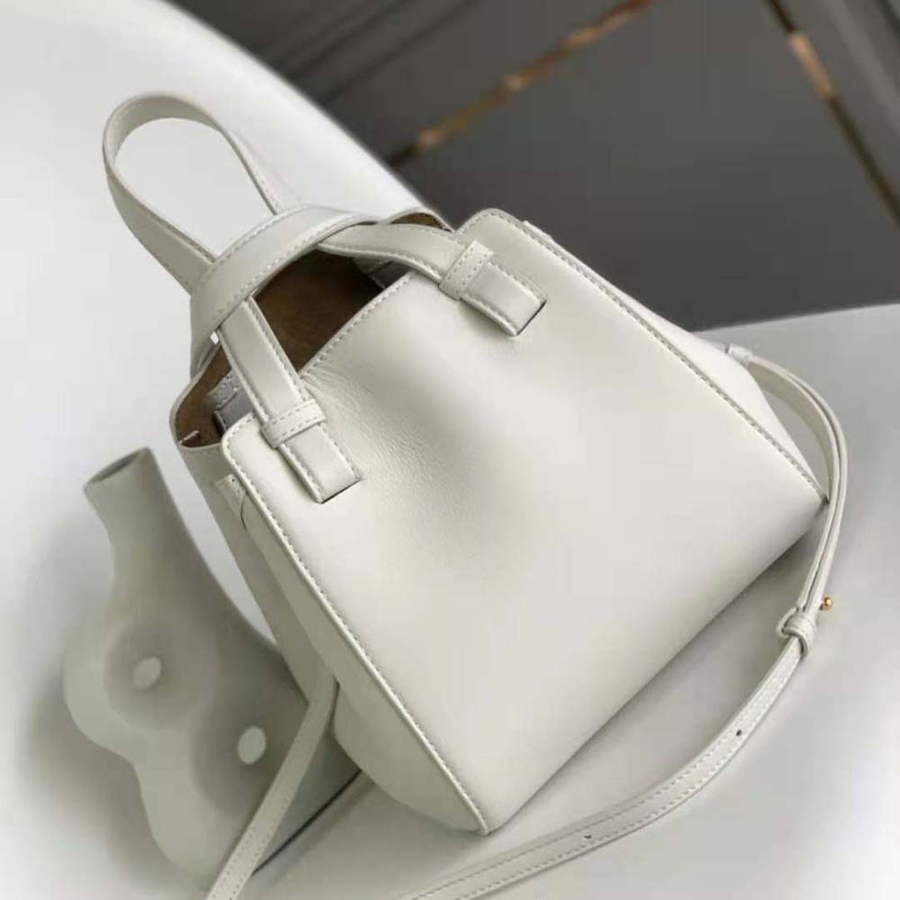 Side angle highlighting sculptural silhouette of Loewe Women Hammock Nugget Bag
