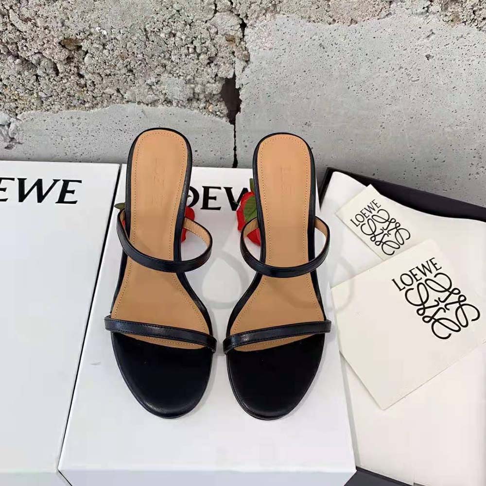 Close-up of sculptural rose detail on Loewe Women Rose Heel Sandal