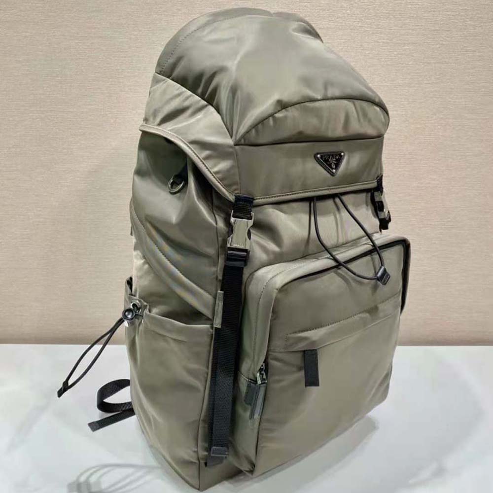 Side angle showing adjustable straps on Prada Men Re-Nylon Backpack