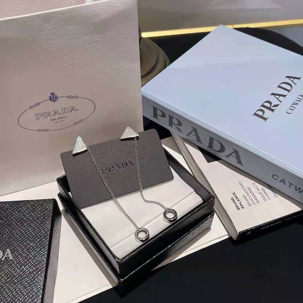 Close-up of crystal logo detail on Prada Women Crystal Logo Jewels AirPods Pendant Earrings